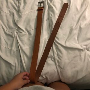 tan belt.